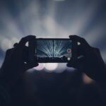 iphone, concert, lights, stage lights, record, video, recording, video recording, capture, apple product, hands, audience, event, live event, live performance, dark, party, smartphone, crowd, video, video, video, video, video
